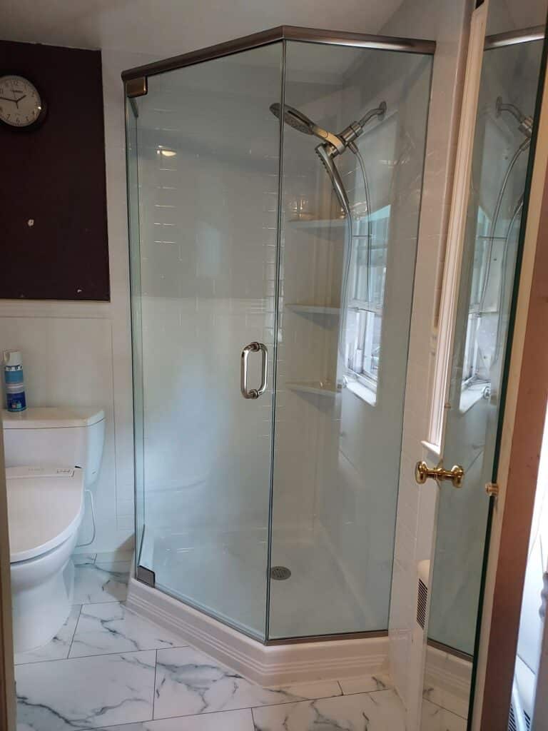 corner walk in shower with white base